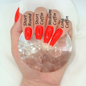 May include: A hand model shows five different nail shapes: short round, short coffin, medium coffin, long coffin, and short oval. All nails are painted a bright red.