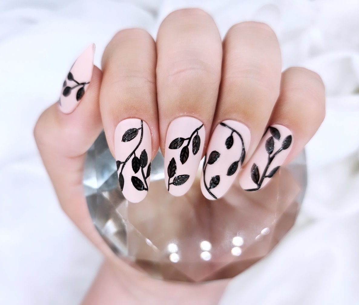Simple Black Nails with Floral Touch