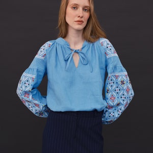 Powder blue linen traditional vyshyvanka blouse for women with tassels