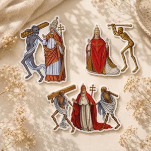 May include: Three die-cut stickers featuring historical illustrations of popes in red and white liturgical vestments accompanied by skeletal figures. The designs depict figures carrying wooden beams or wielding clubs, rendered in a classic art style.