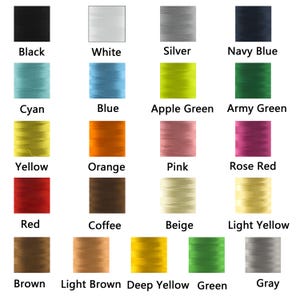 May include: A color chart featuring spools of thread in various colors, including black, white, silver, navy blue, cyan, blue, apple green, army green, yellow, orange, pink, rose red, red, coffee, beige, light yellow, brown, light brown, deep yellow, green, and gray.