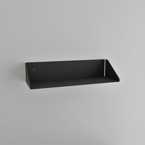 modern matte black wall mounted bookshelf