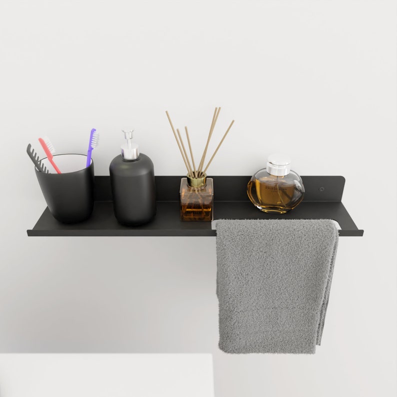 Minimalistisk badrumshylla i metall med handdukshängare - Modern badrumsorganisatör bild 1