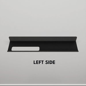Minimalistisk badrumshylla i metall med handdukshängare - Modern badrumsorganisatör bild 8