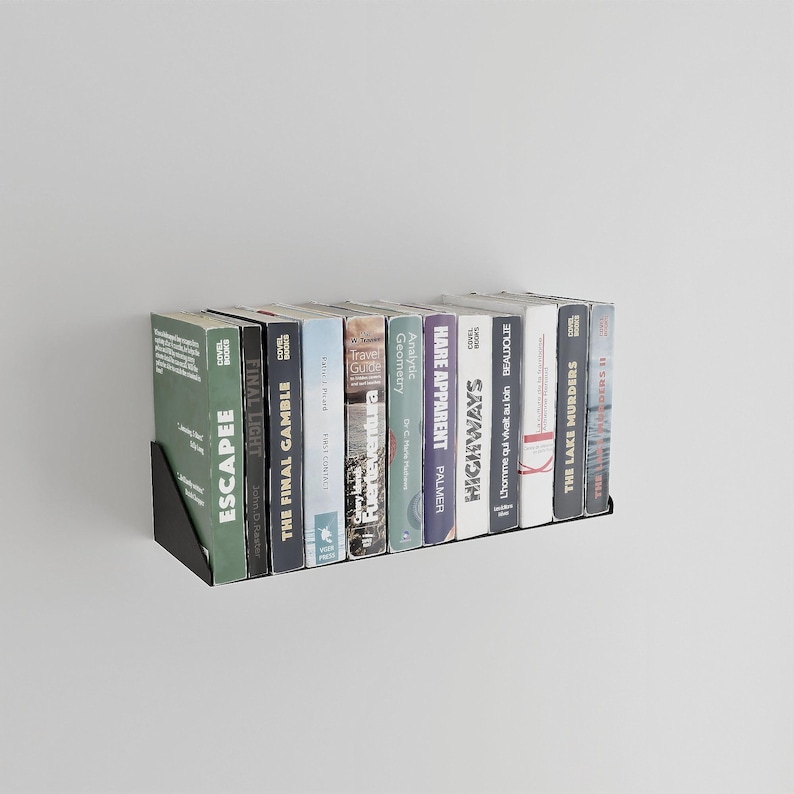 minimalist matte black wall mounted bookshelf