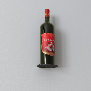 May include: A black metal wine bottle holder with a single bottle of red wine. The bottle label reads "Cornava" and "Red Burgundy Wine".