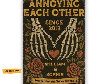 May include: A rectangular metal sign with the text "ANNOYING EACH OTHER SINCE 2012". The sign features skeleton hands holding a heart, roses, and the names "WILLIAM & SOPHIE". The sign has a personalized label.