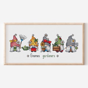 May include: Five gnomes with different coloured hats and outfits are lined up. Each gnome is holding a gardening tool, such as a rake, watering can, sunflower, box, and a fork. The gnomes are on a white background with the text "Gnomes gardeners" below them.