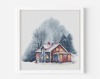 Puede incluir: Un patrón de punto de cruz que representa una casa roja y azul con nieve cayendo a su alrededor. La casa tiene ventanas con luces amarillas y una chimenea. Hay árboles en el fondo.
