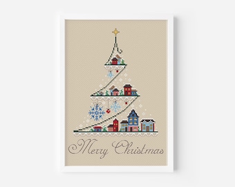 May include: Cross-stitch pattern of a Christmas tree with houses and snowflakes. The tree is decorated with red and blue ornaments. The text "Merry Christmas" is written below the tree.