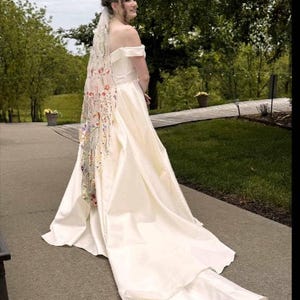 Back view of satin overskirt real bride