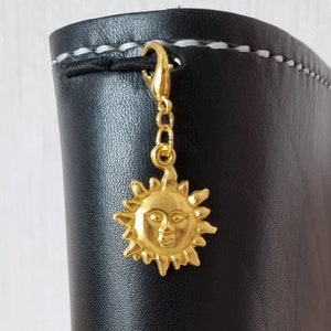 Planner charm pendant gold-colored metal sun