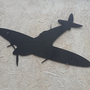 A Black Coated Wooden Silhouette Spitfire Figure to Wall Mount for Remembrance. 11&quot; Wingspan.