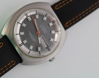 Luxor Day Date Compressor Super Automatic Men’s Wristwatch in Pristine Condition Swiss Made
