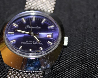 Montre vintage Princeton New Old Stock avec incroyable cadran bleu fascinant - Fabriquée en Suisse - Parfait état, jamais portée - Mécanisme manuel