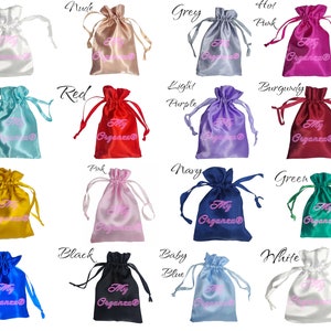 May include: Assortment of 16 satin drawstring bags in various colours, including white, nude, grey, hot pink, mint, red, light purple, burgundy, gold, pink, navy, green, royal blue, black, baby blue, and white. Each bag has the text "My Organza" printed on it.