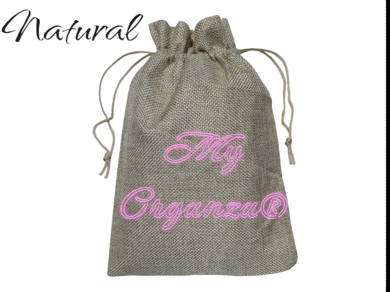 May include: A natural burlap drawstring bag with the text "My Organza&reg;" embroidered in pink.