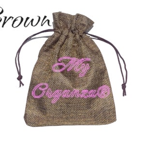 May include: A brown burlap drawstring bag with a pink embroidered logo that says "My Organza&reg;".