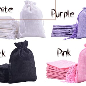 May include: A set of 10 small drawstring bags in four colors: white, purple, black, and pink. The bags are made of a woven fabric and have a drawstring closure. The bags are stacked in piles of 10, with one bag displayed open.