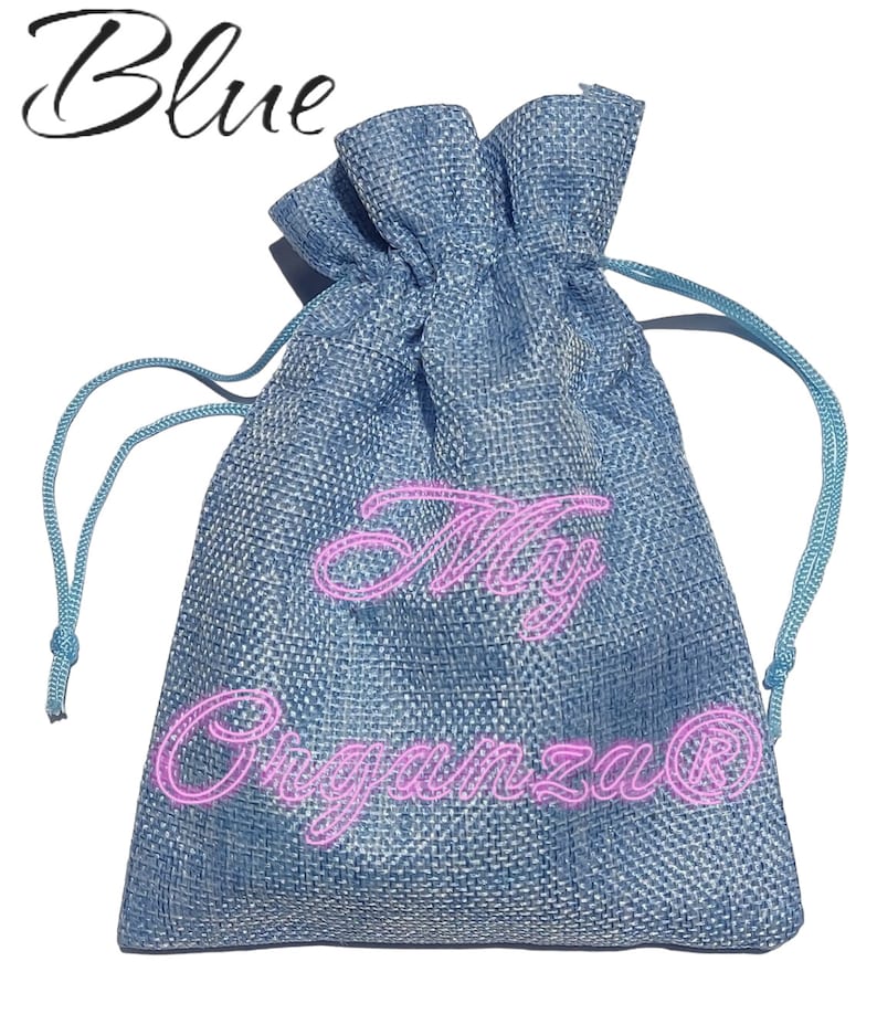 May include: Blue drawstring bag made of burlap with the words "My Organza" embroidered in pink.