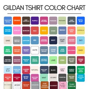May include: A Gildan T-shirt color chart featuring a grid of sixty-three rounded square swatches, each labeled with its specific color name. The chart displays a wide variety of hues including heather, solid, and antique shades for apparel.
