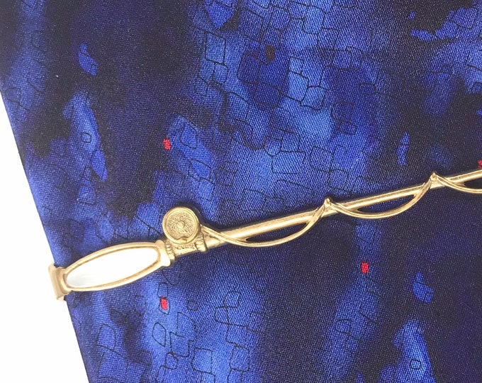 Gold-tone and Mother of Pearl Fishing Reel Classic Vintage Tie Clip