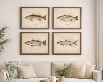 May include: Four framed prints of fish illustrations. Each print features a different fish species, including Redfish, Snook, Spotted Seatrout, and Tarpon, with their names below. The prints have a vintage aesthetic with a neutral color palette and are displayed above a beige sofa.