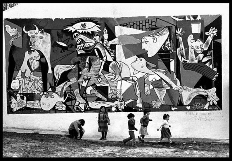 May include: Black and white photograph of a large mural depicting a scene of abstract figures and animals.  Children are standing in front of the mural.