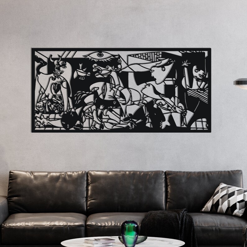 May include: Black and white metal wall art depicting a famous painting by Pablo Picasso. The artwork features a bull, a woman, and other abstract figures.
