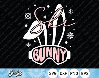 Könnte beinhalten: Ein weißer Hase mit rosa Ohren, der eine Skibrille trägt und das Wort "Ski Bunny" in rosa Buchstaben. Der Hintergrund ist schwarz mit weißen Schneeflocken.