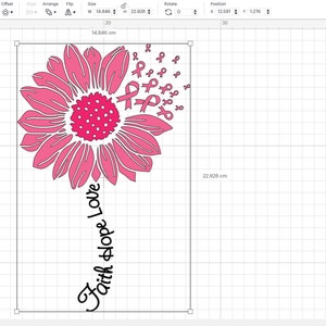 May include: Pink sunflower with pink ribbon cutouts and the text "Faith Hope Love" in a cursive font.