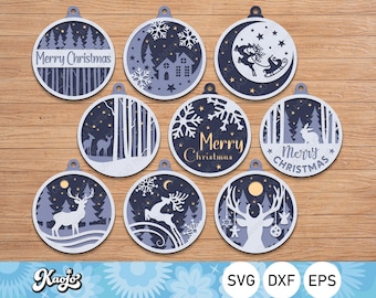 May include: Set of ten blue and white Christmas ornament SVG cut files featuring various winter scenes, including a deer, a rabbit, a house, snowflakes, and the text "Merry Christmas".