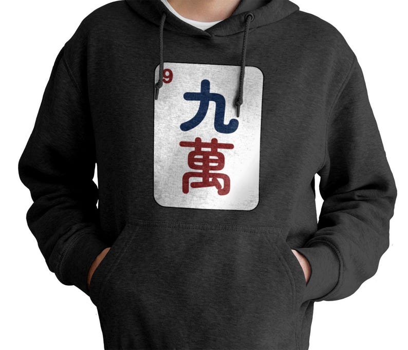 May include: Dark gray hoodie with a front pocket and a drawstring hood. The hoodie features a white rectangular graphic with the number "9" and Chinese characters in blue and red.