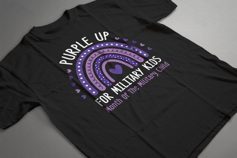 May include: Purple Up for Military Kids t-shirt featuring a rainbow design and the text "Month of the Military Child".