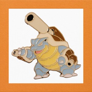 May include: A blue and yellow enamel pin of a Blastoise Pokemon. The Pokemon is holding a water cannon in its right hand and has a large cannon on its back.
