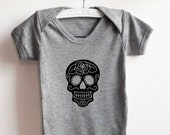 Grey 100% cotton baby vest with "Mexican Skull" design.