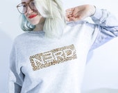 Unisex heather sweatshirt with “NERD cut out” design in wild leopard