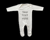 Personalised soft baby romper in white. 100% cotton. 20 different fonts & more available. Front and back print available.