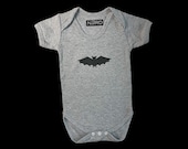 Grey 100% cotton baby vest with "Bat" design.
