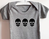 Grey 100% cotton baby vest with "Three Skulls" design.