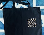 Black Cotton tote bag with “baby lamas in leopard” design. Basic Shopper - Vinyl Bag.