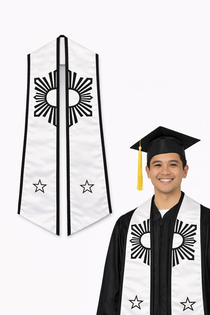 May include: White graduation stole with black accents and a sunburst design. The stole also features two stars and is worn by a person in a graduation gown and cap. The stole is a symbol of achievement.