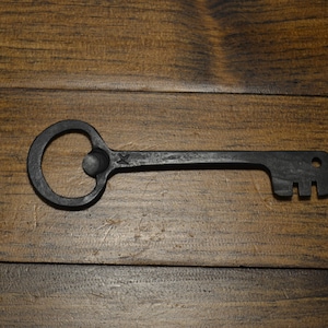 Forging a key keychain bottle opener