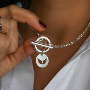 Médaille ailes d'ange mini sur collier toggle