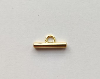 Barra 20 mm con anello centrale dorato con oro zecchino