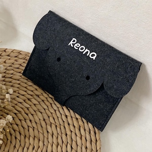 May include: A rustic wooden sign with the text "Welcome to our home" in white lettering. The sign features a distressed finish and a simple, inviting design, perfect for entryway decor.