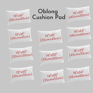 May include: A set of nine white oblong cushion pads in various sizes, ranging from 12 inches by 16 inches to 18 inches by 24 inches. The cushion pads are labelled with their dimensions in both inches and centimetres.