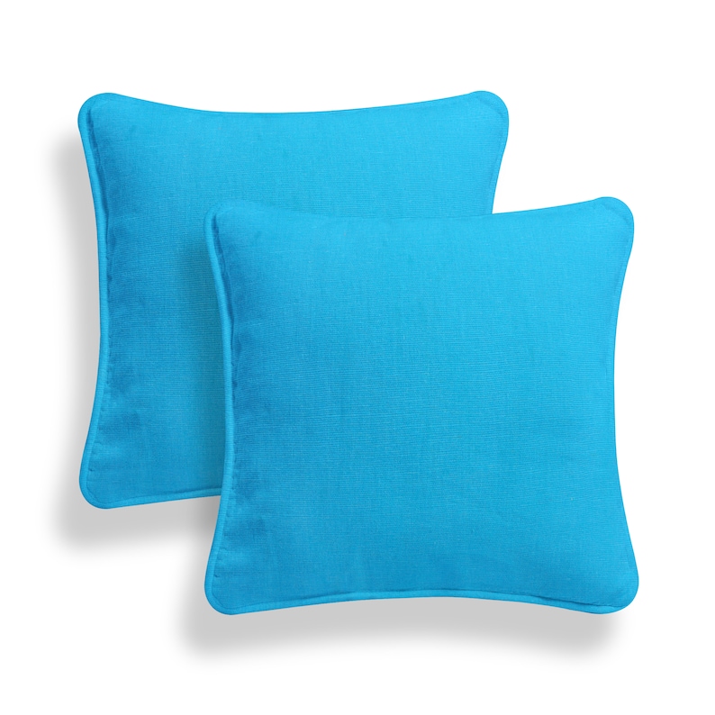 May include: Two turquoise blue square throw pillows with a subtle texture. The pillows are made of a soft, durable fabric and are perfect for adding a pop of color to any room.
