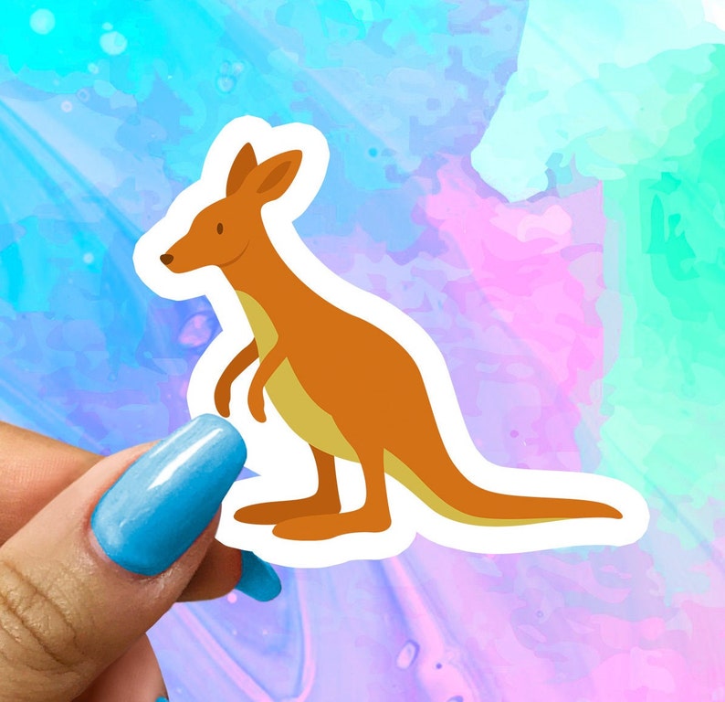 May include: A cartoon kangaroo sticker with a brown body and a white outline. The kangaroo is standing on its hind legs with its tail curled behind it. The sticker is on a colorful background.