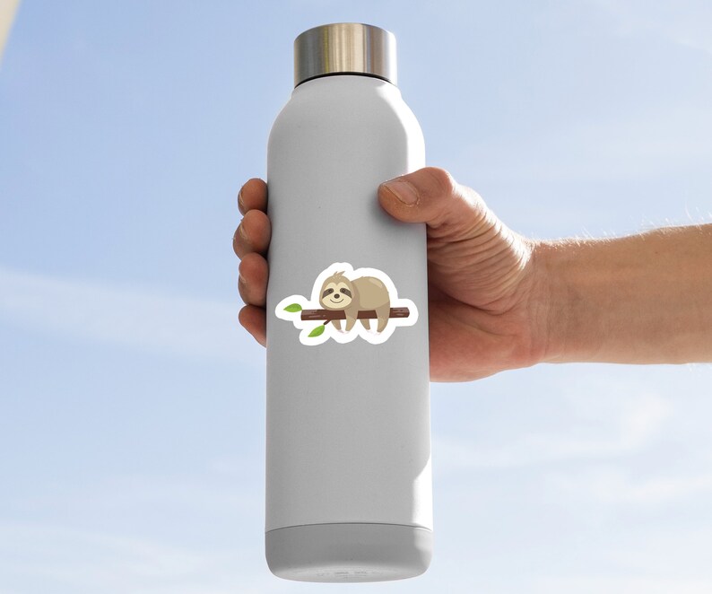 May include: A white water bottle with a sticker of a cartoon sloth sleeping on a branch. The sloth is brown with a light brown belly and has a small smile on its face.